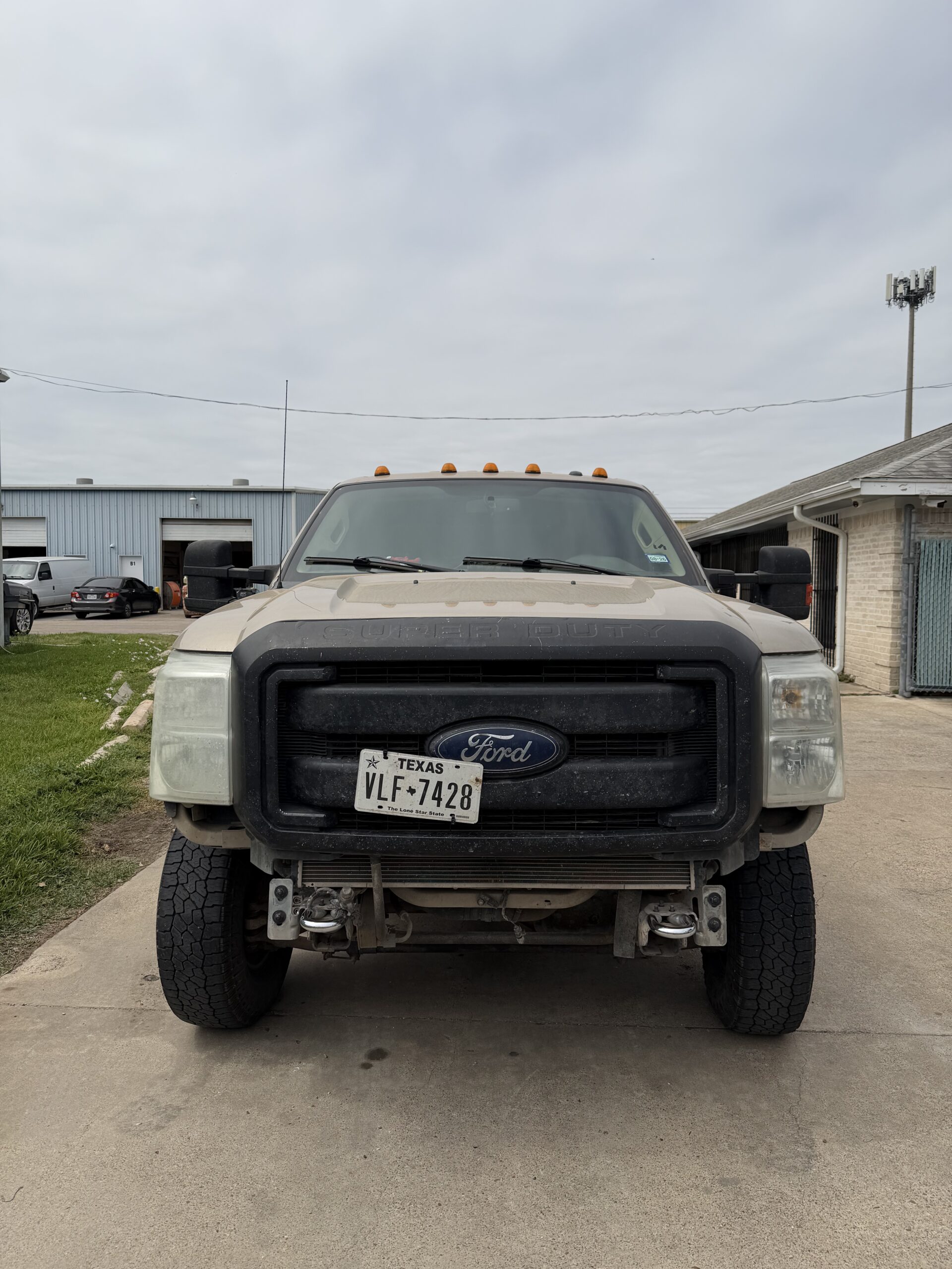 Ford Super Duty with factory front bumper removed ready for aftermarket upgrade