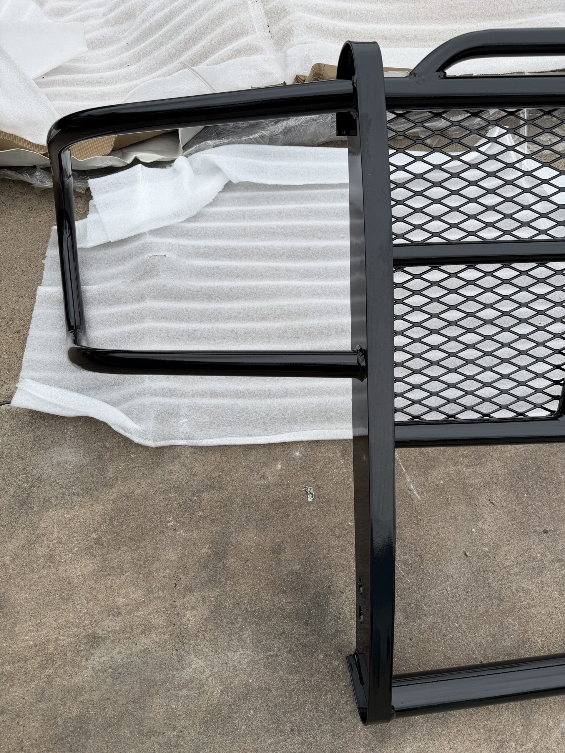 Tough Country GMC grill guard — installed angle