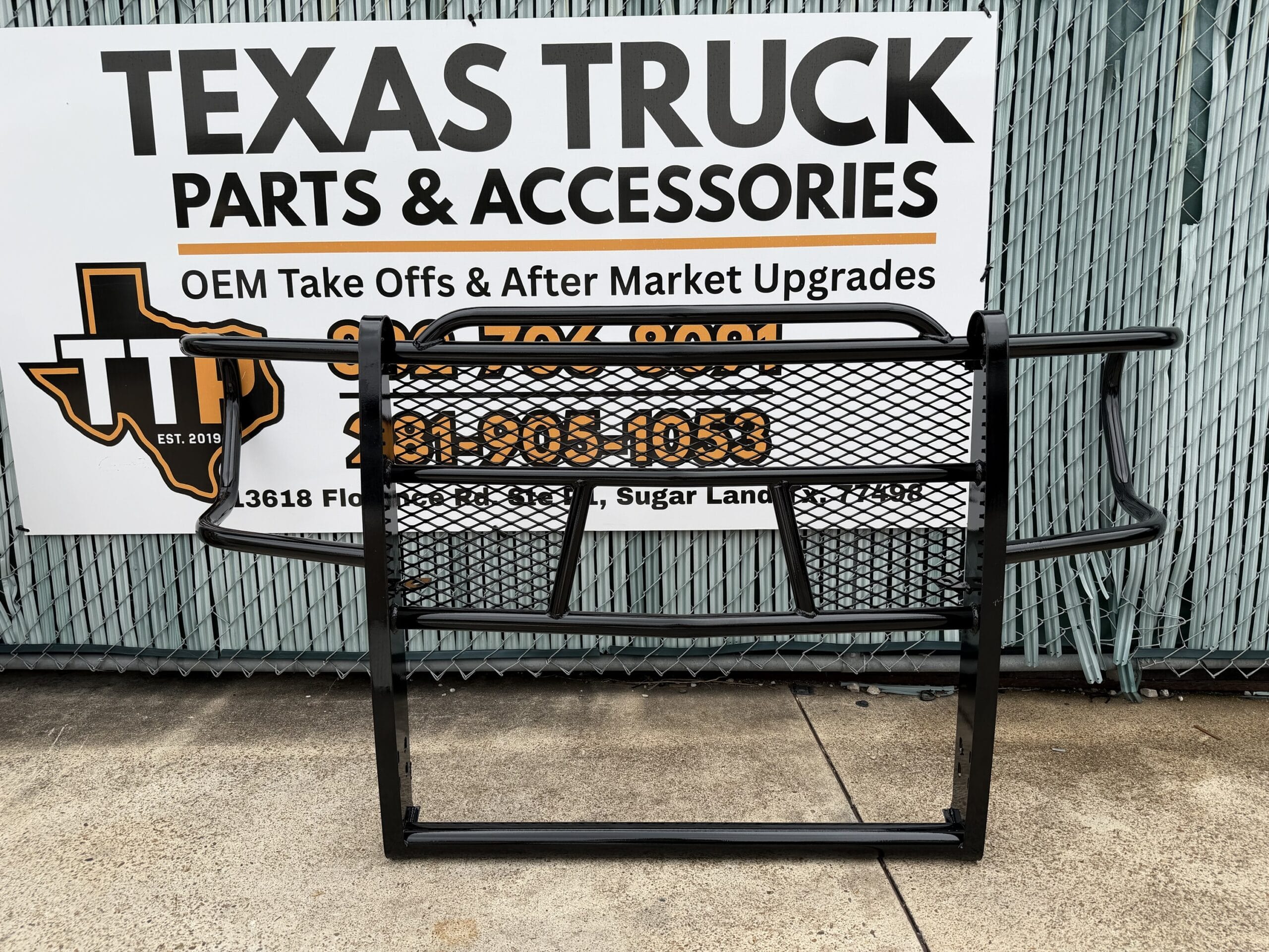 Tough Country GMC grill guard — side angle view