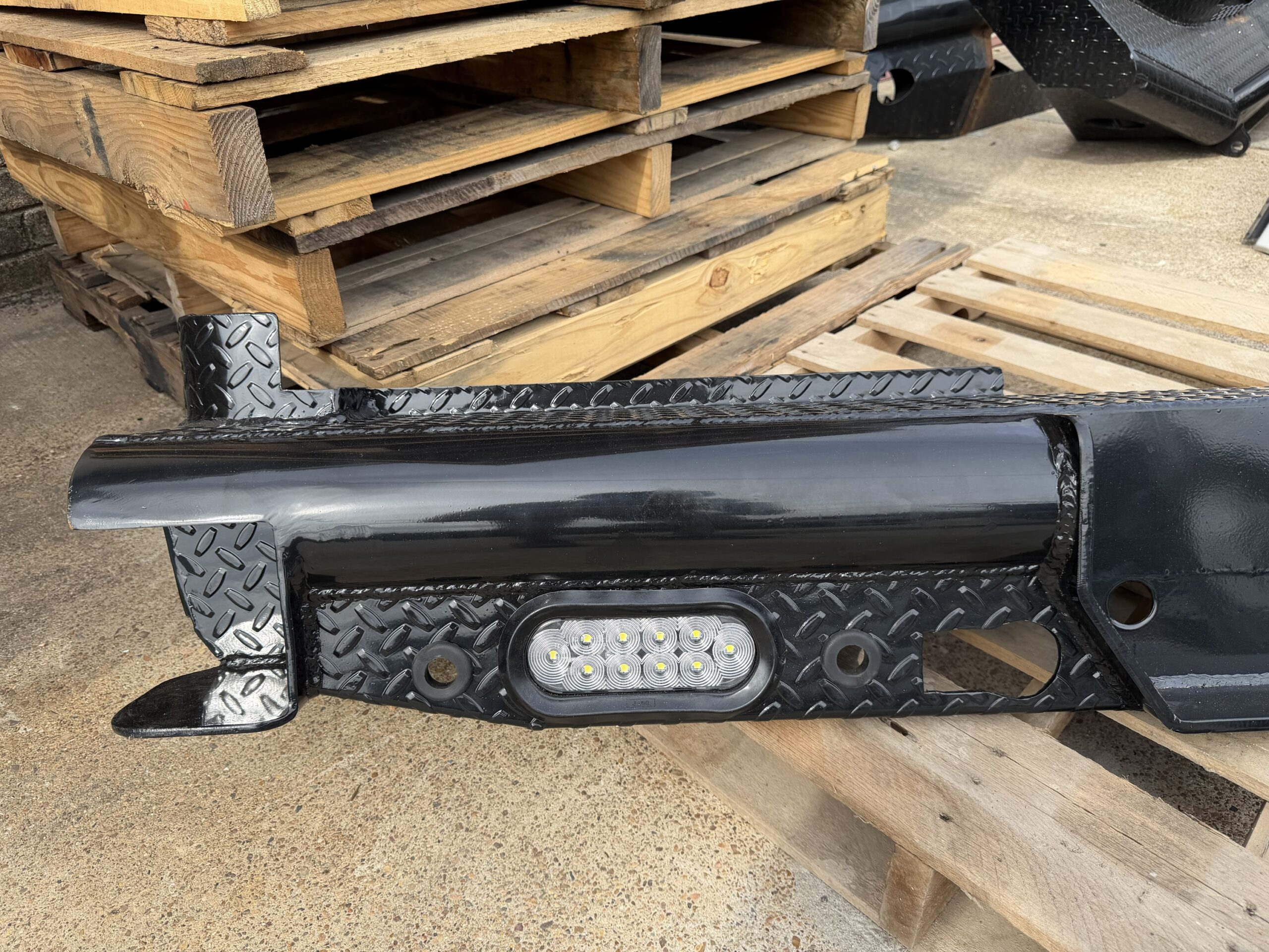 One Source Ford F250 bumper — angle view