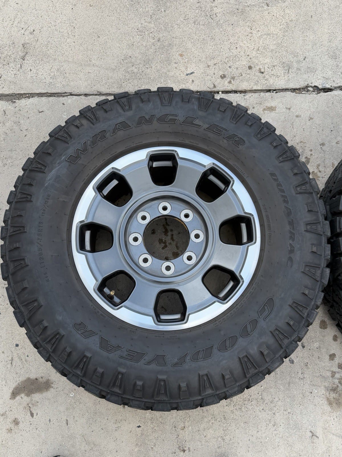 Ford F250/F350 18" Tremor OEM wheel and tire package at Texas Truck Parts