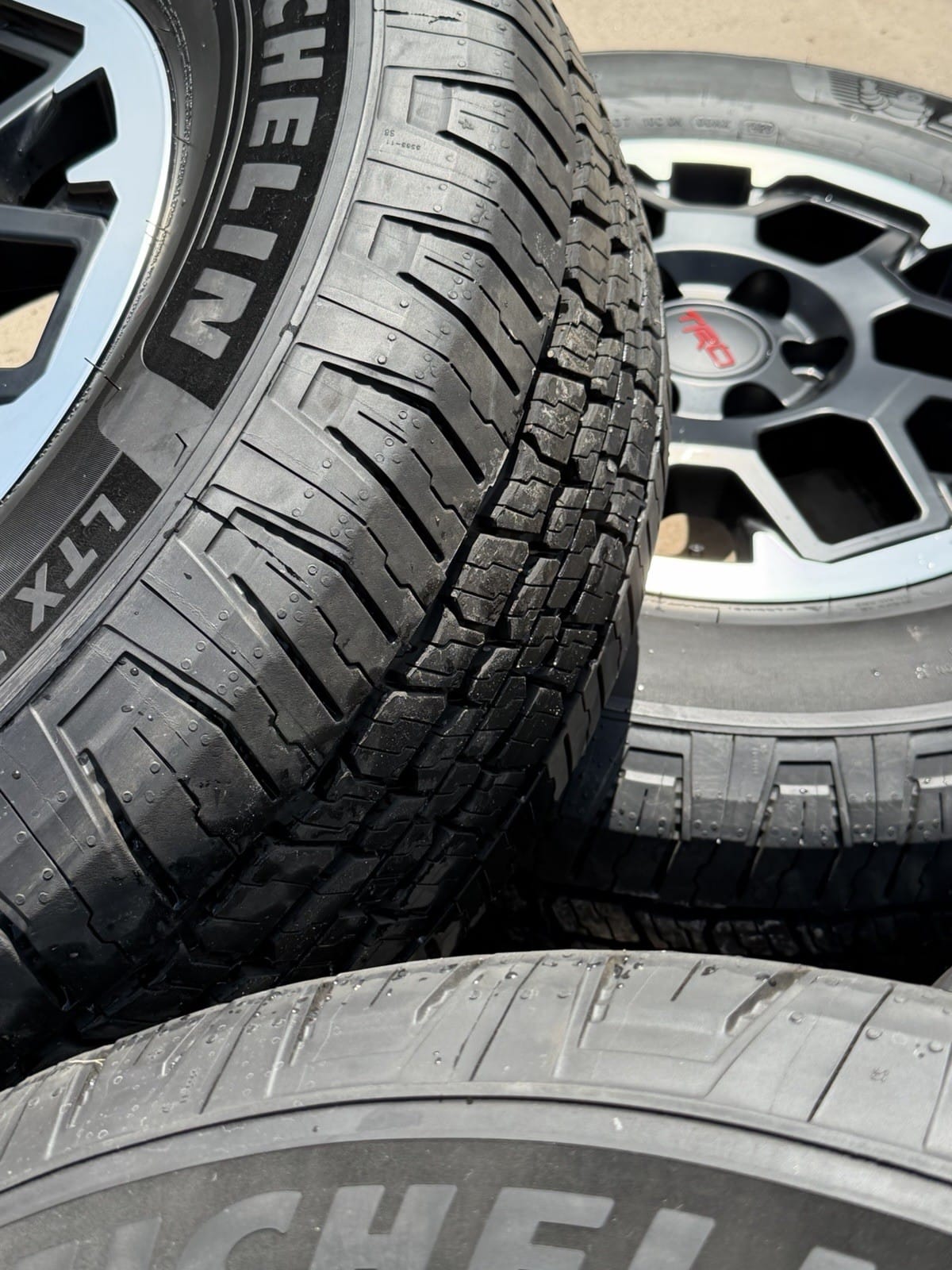 Toyota Tacoma TRD Pro 18" Off-Road OEM wheel and tire package at Texas Truck Parts