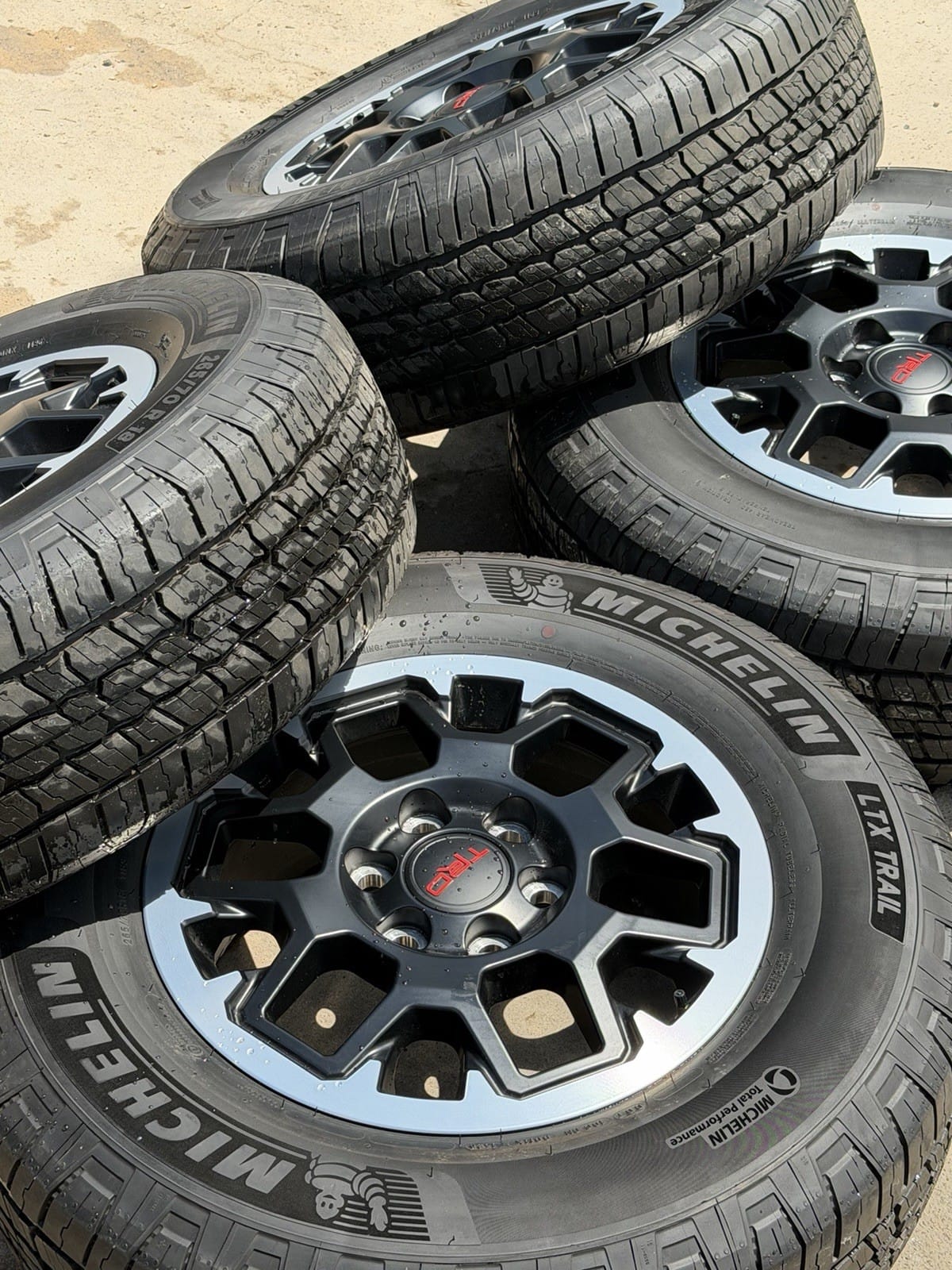 Toyota Tacoma TRD Pro 18" Off-Road OEM wheel and tire package at Texas Truck Parts