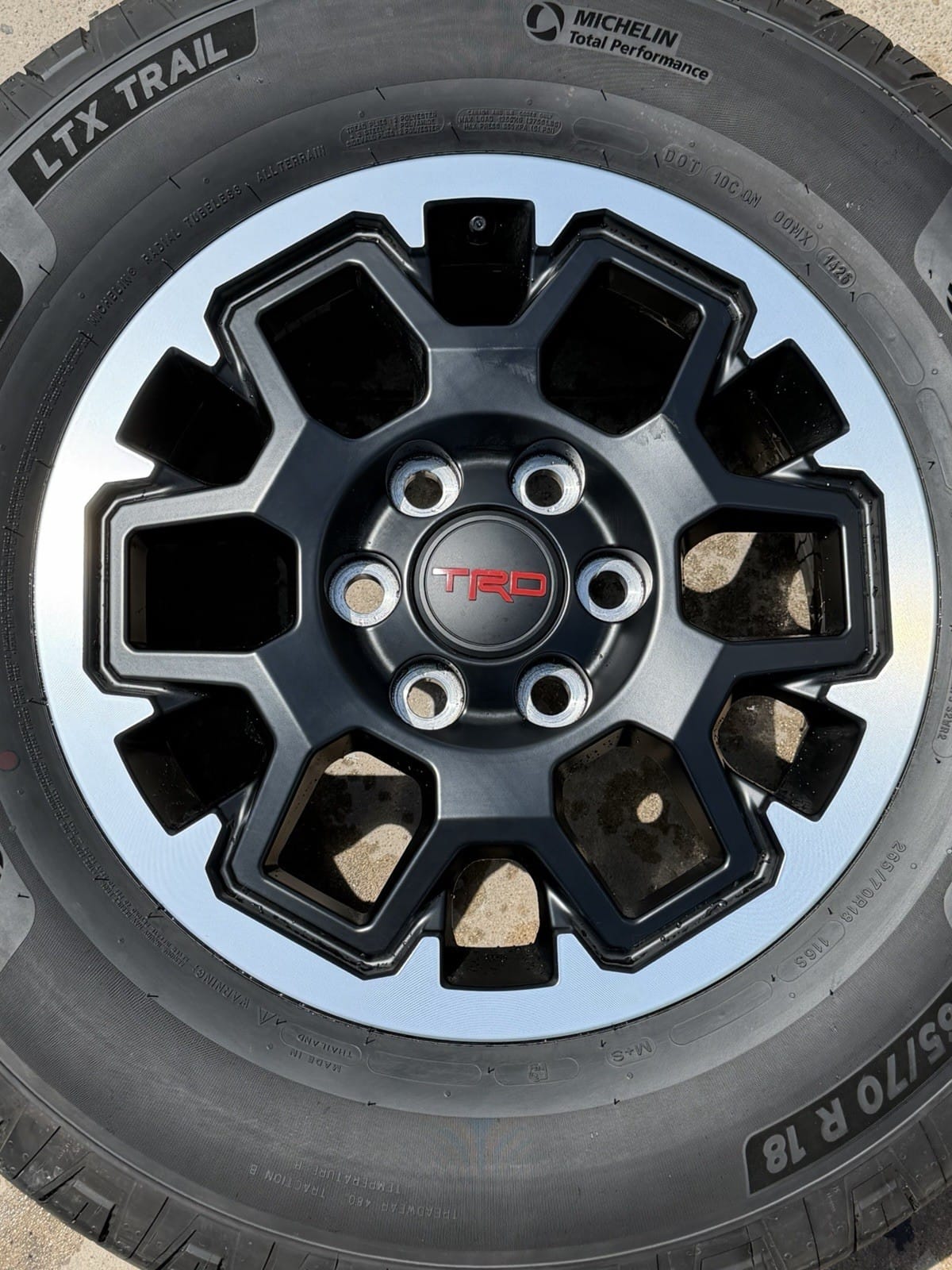 Toyota Tacoma TRD Pro 18" Off-Road OEM wheel and tire package at Texas Truck Parts